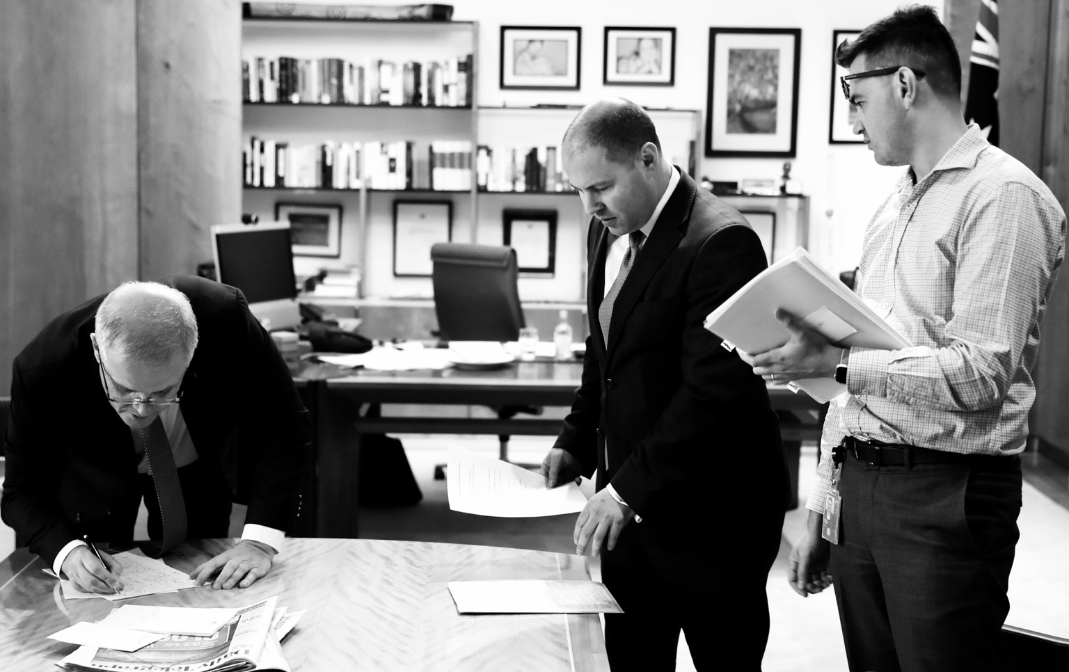 Scott Morrison, Josh Frydenberg and Kane Silom preparing for a press conference during the COVID-19 pandemic